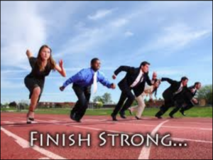 6 Business Persons running a race with "finish strong" at the bottom of the image